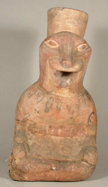 Seated anthropo-zoomorphic figure