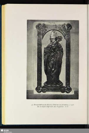 Bronzedenkmal des Bischofs Dietrich von Schönberg im Nordquerschiff unter dem Orgelchor