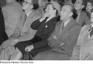 Lachende Zuschauer