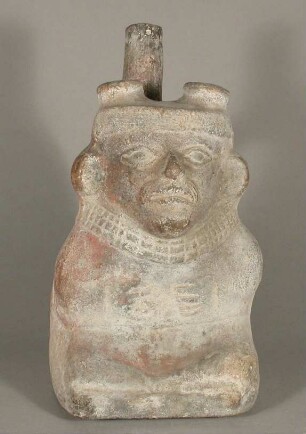 Sitzende anthropomorphe Figur