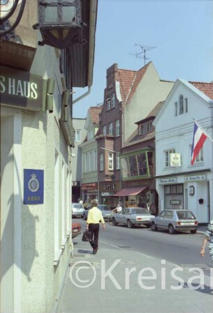 Besttorstraße 10, 11, 12, 13: Häuser von rechts nach links: Gaststätte Hansa-Stube, Lederhaus Schultz, Optiker Seidensticker, Drogerie Bartels: im Vordergrund links Eckhaus Hotel "Deutsches Haus"