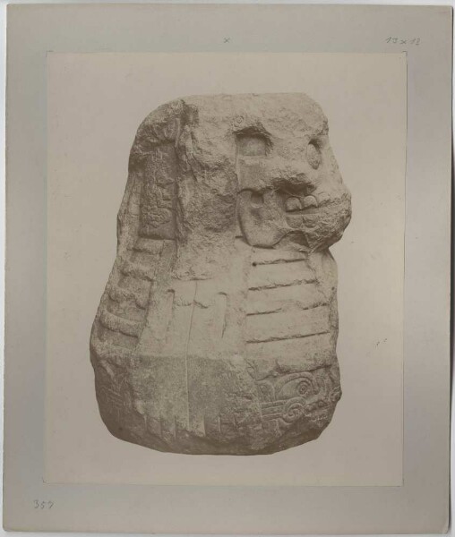 Stone figure of the Couatlicue mociuaquetzqui. Side view.