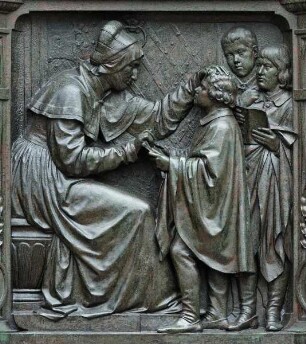 Denkmal für Martin Luther — Sockelrelief: Luther als Knabe in Eisenach