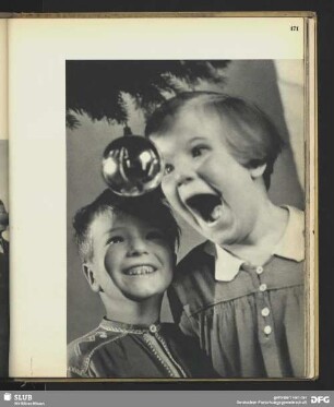 Das Kinderbild in der Christbaumkugel