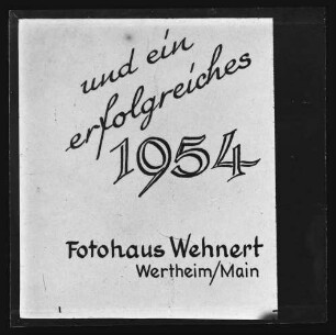 Teil einer Karte o.ä. mit Schriftzug "und ein erfolgreiches 1954 Fotohaus Wehnert Wertheim/Main"