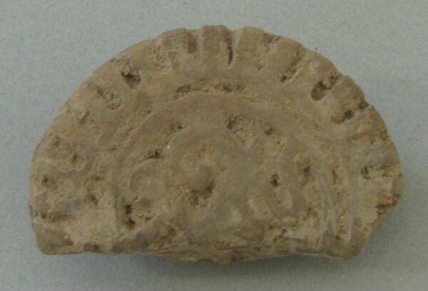 Tampon d'argile (fragment)