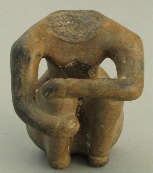 Lower part of a clay figure