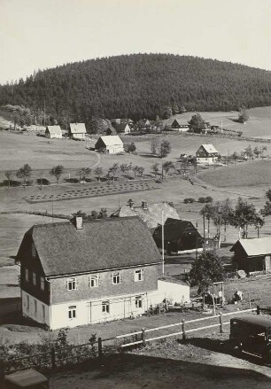 Altenberg-Rehefeld. Teilansicht mit Häusern am Altenberger Hang