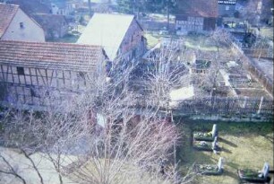 Blick auf den Ort aus dem Kirchturm, Gärten und Häuser