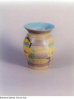 Vase mit männlichem und weiblichem Gesicht