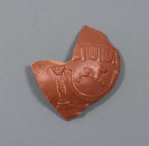 Teilstück einer Reliefschüssel als Brennprobe