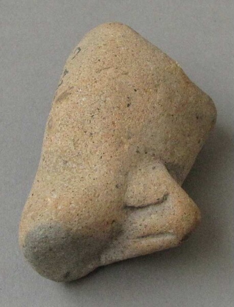 Clay vessel foot (?)