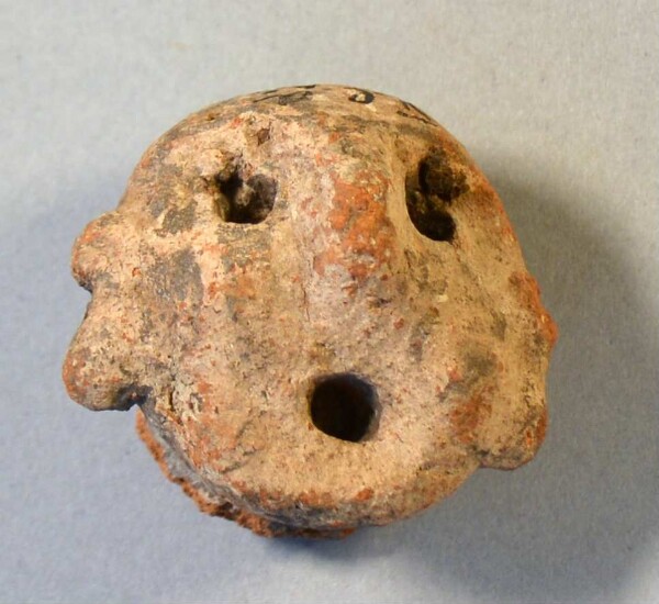 Clay head (fragment)