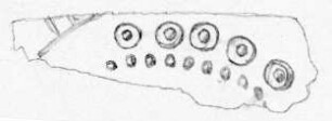 Fragment einer Rosette (?) oder eines Blechs mit kreisrunder Verzierung