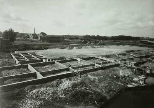 Güstrow. Blick von der Speicherstraße über die Baustelle Kongreßhalle zur Nebelbrücke in der Bützower Straße