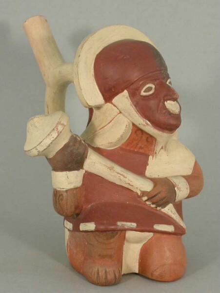 Kneeling anthropomorphic figure with club