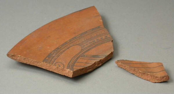 Fragments of a clay plate