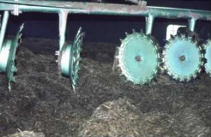 Fotografie: Silageentnahme, Ein- und Auslagerungstechnik, Hochsilo, Silofräse