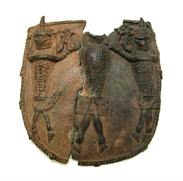 Small hanging plaque with three figures