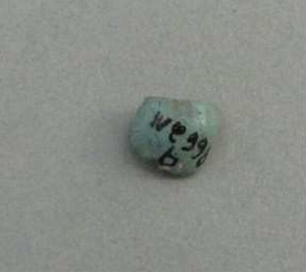 Stone bead (fragment)