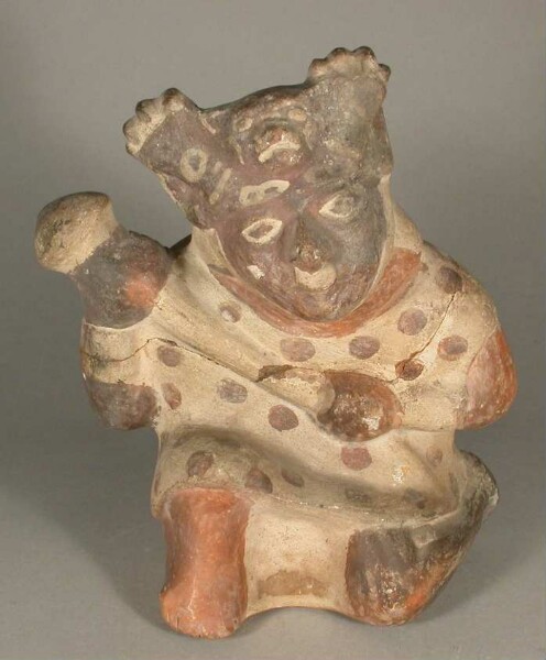 Figure anthropomorphe agenouillée