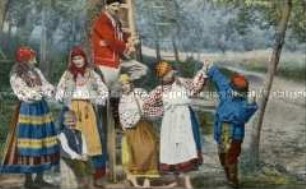 Frauen und Kinder in ukrainischer Volkstracht beim Tanz