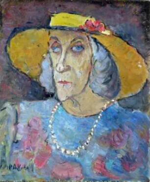 Frau mit Strohhut