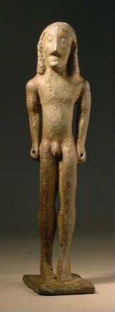 Archaische Statuette eines nackten, stehenden Jünglings