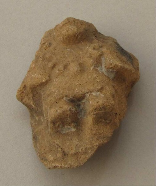 Figurine en argile (fragment)