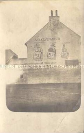 Werbung für Kriegsanleihen an einer Hauswand