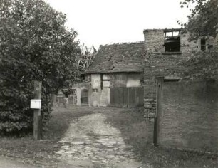 Großstolpen-Pödelwitz. Ehem. Dreiseithof, Nr. 27 (1731 beg.). Straßenansicht der ehem. Wirtschaftsgebäude