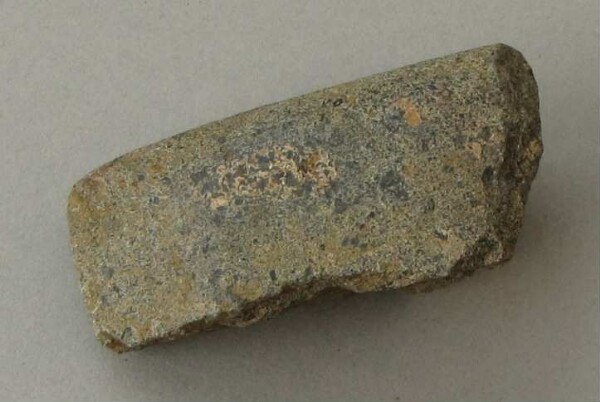 Stone axe blade (fragment)