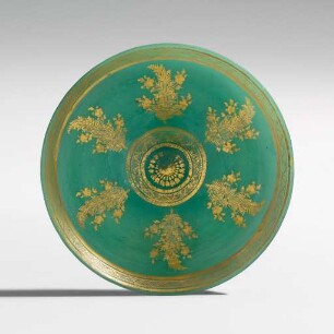 grüner Teller mit Golddekoration