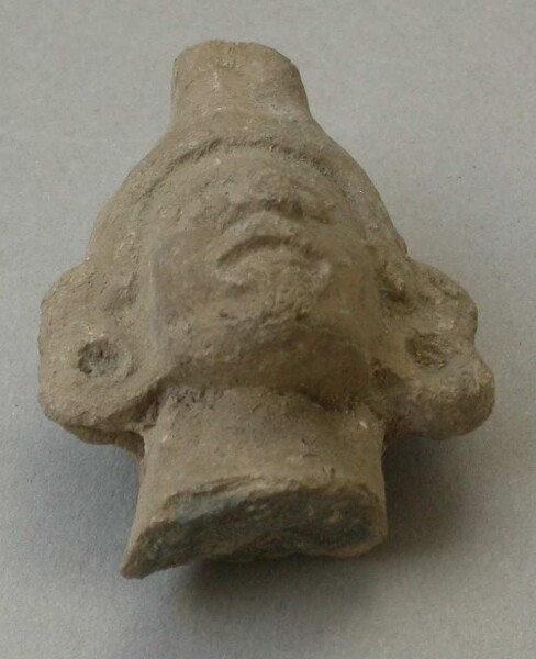 Fragment of a clay rattle (clay head)