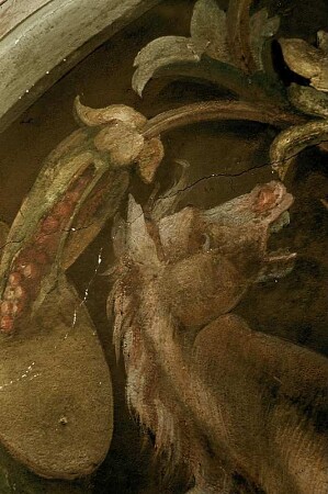 Mars, gerahmt von zwei Pferdeköpfen in Ranken
