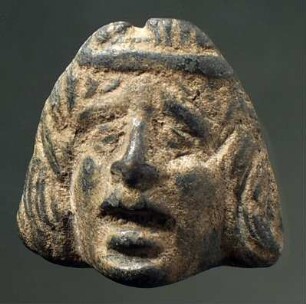Applik in Form einer tragischen Maske