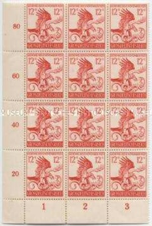 Fragment eines Bogens mit 12 Briefmarken zum Gedenken an den Hitlerputsch am 9. November 1923
