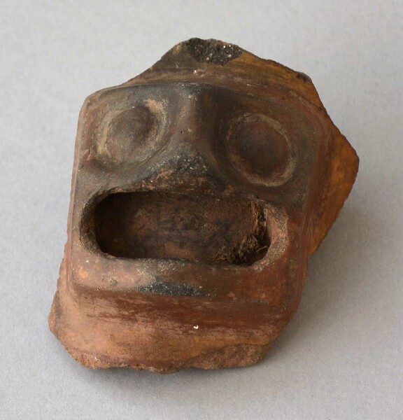 Vessel shard (clay face)