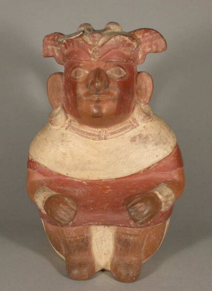 Seated anthropomorphic figure