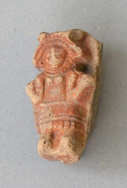 Figurine en argile (fragment de récipient)