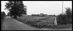 Dorfstraße mit Strugabrücke