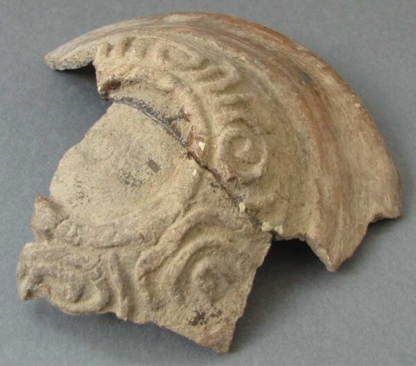 Fragment of a clay vessel