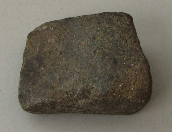 Stone axe blade (fragment)