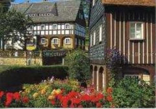 Umgebindehäuser in der Dorfmitte von Waltersdorf/Oberlausitz
