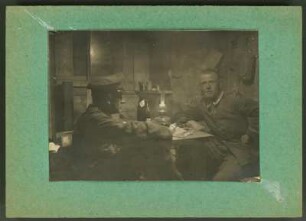 Otto Dix als Soldat beim Trinken mit einem Kameraden. (1916). 7,6 x 10,6 cm. Montiert auf Cartonblatt 10,6 x 14,9 cm, dieses verso bezeichnet "Dix 1916" : Otto Dix als Soldat beim Trinken mit einem Kameraden. (1916). 7,6 x 10,6 cm. Montiert auf Cartonblatt 10,6 x 14,9 cm, dieses verso bezeichnet "Dix 1916". Reproduktion aus Teilnachlass Marga Kummer (1892-), SLUB Mscr.Dresd.App.2581