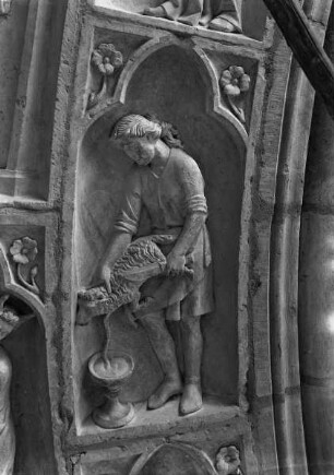 Nördliches Westportal — Linke Archivolte — Das Schlachten des Passahlammes