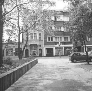 Cottbus-Mitte, Schloßkirchplatz 4/5. Wohn- und Geschäftshäuser (1909, A. 20. Jh.). Straßenfront