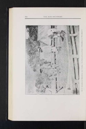Abb. 9 Umwenden der Kakaobohnen beim Trocknen. (Aus Warburg-Somerem-Brand, "Kulturpflanden der Weltwirtschaft")
