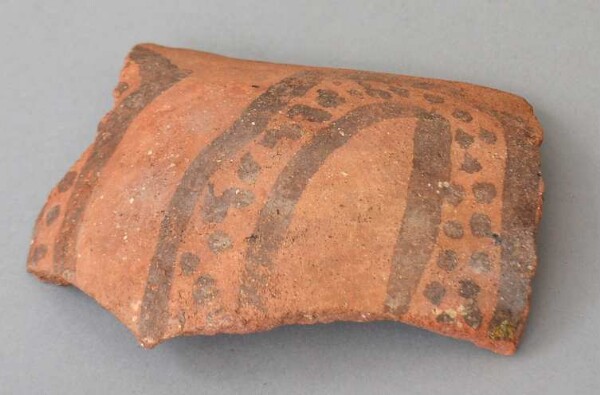 Fragment of a clay vessel