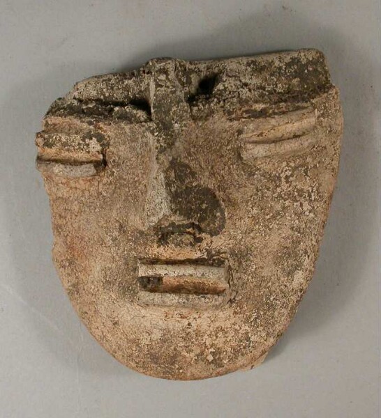 Clay figure (fragment)